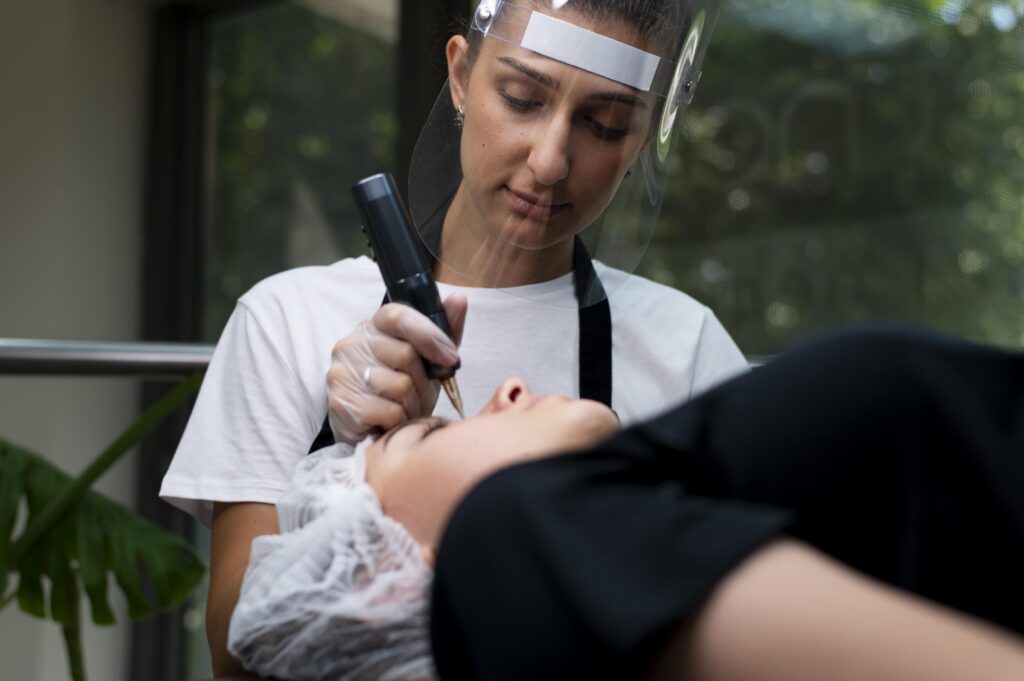 beautician doing microblading procedure