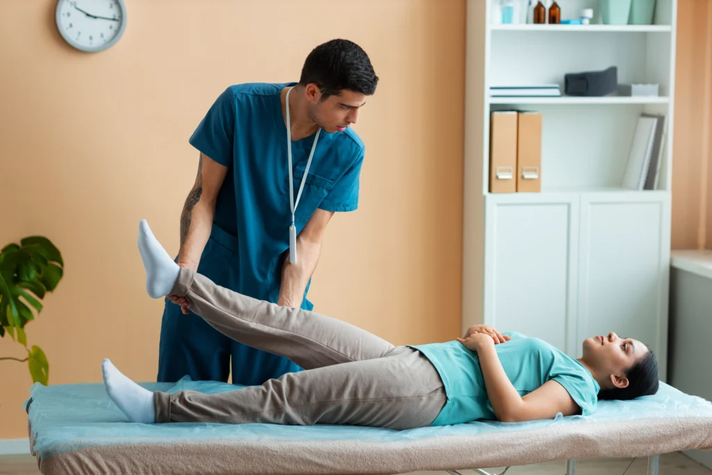 doctor helping patient rehabilitation