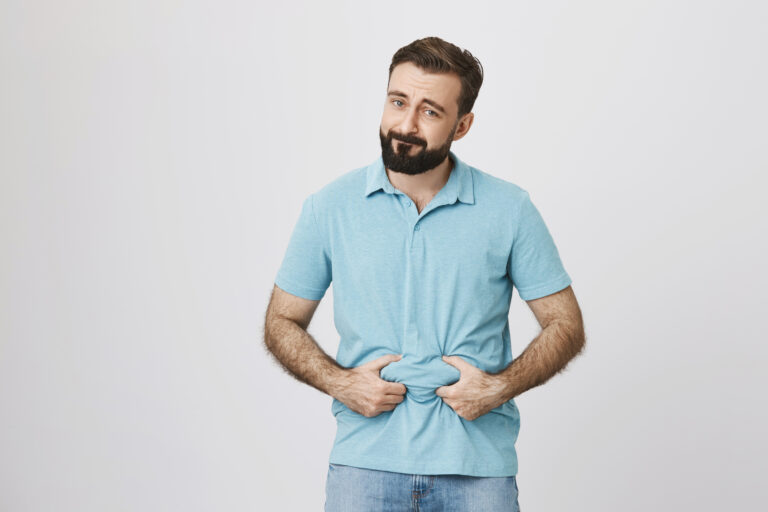 gloomy guy need lose weight showing fat belly