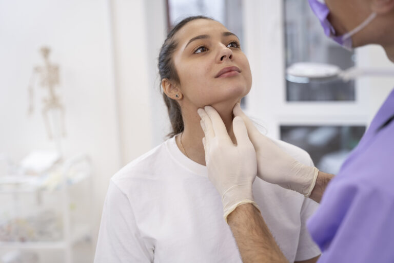 doctor performing routine medical checkup