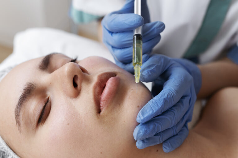 low angle woman getting face prp treatment