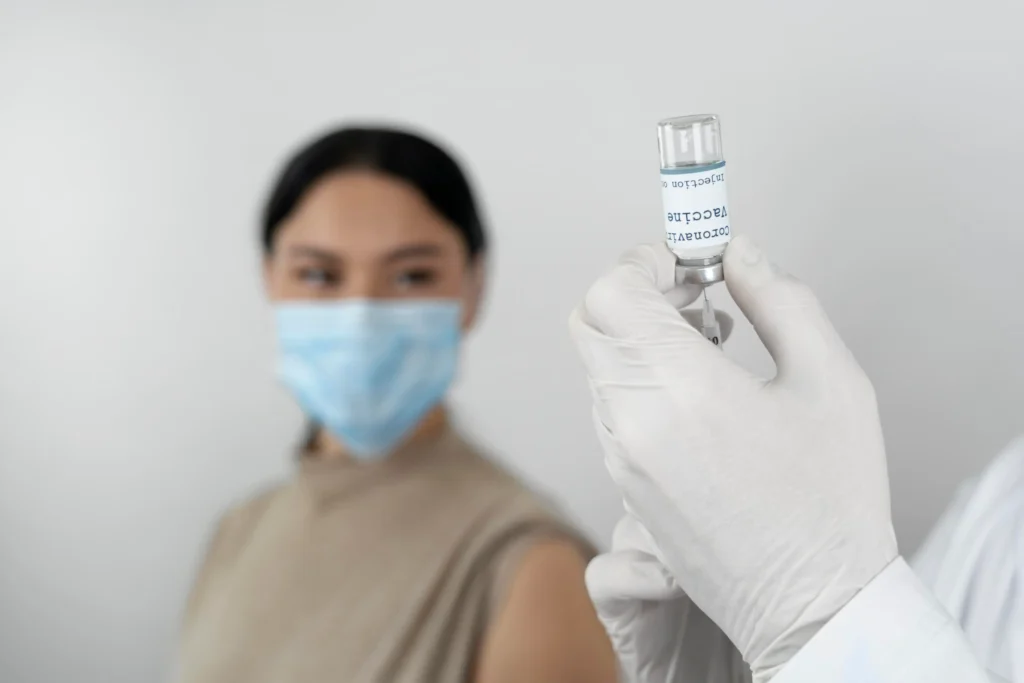 doctor preparing administer vaccine shot female patient 1
