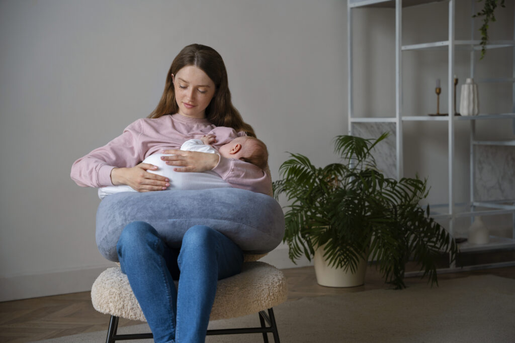 front view mother with cute newborn