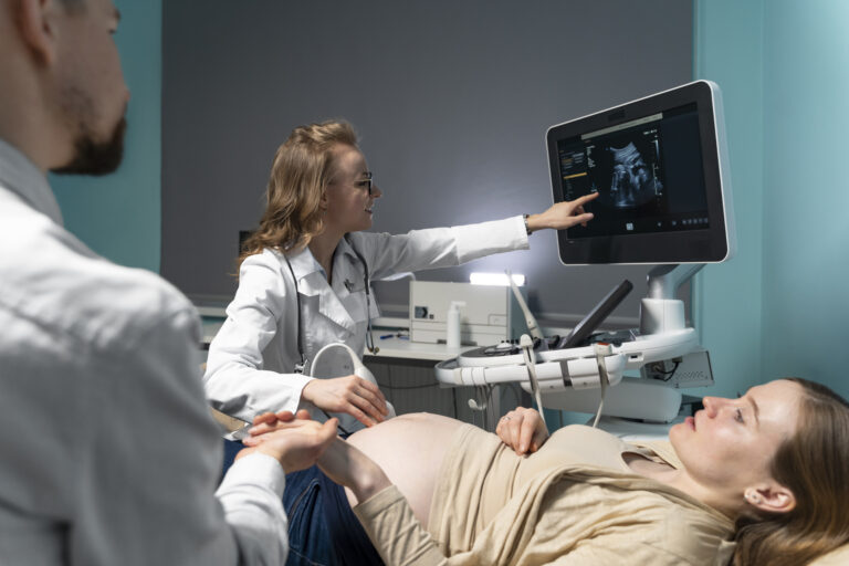 gynecologist performing ultrasound consultation 1